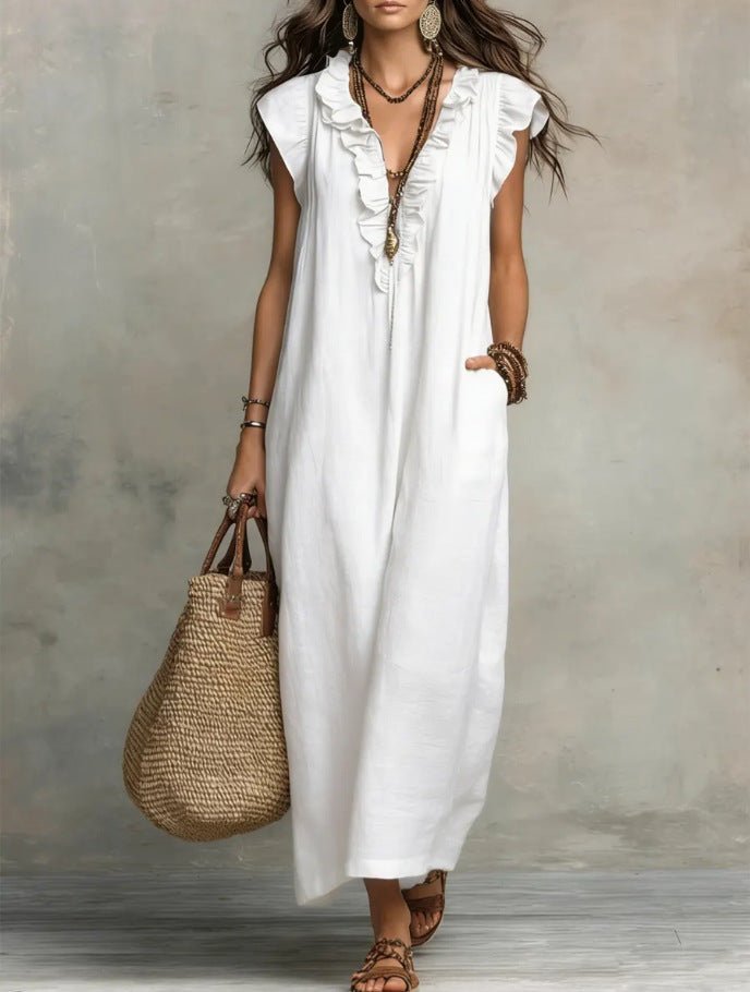 Women's sleeveless ruffle pocket maxi dress by Plush Fashion Hub, casualwear with flowy fabric and stylish ruffle details.
