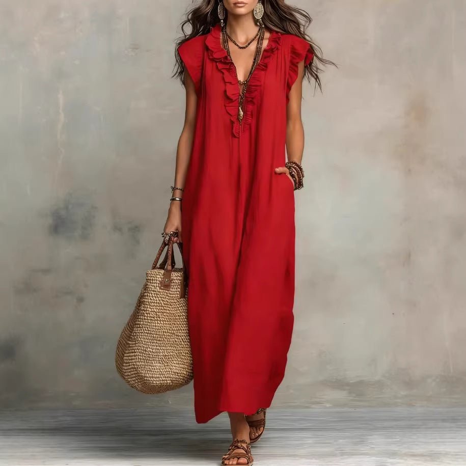 Women's sleeveless ruffle pocket maxi dress by Plush Fashion Hub, casualwear with flowing fabric and stylish ruffle details.