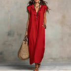 Women's sleeveless ruffle pocket maxi dress by Plush Fashion Hub, casualwear with flowing fabric and stylish ruffle details.