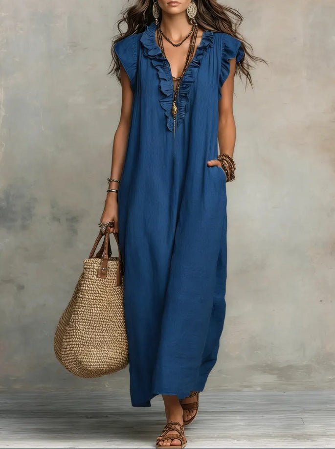 Women's sleeveless ruffle pocket maxi dress by Plush Fashion Hub, casualwear with flowing fabric and stylish ruffle details.