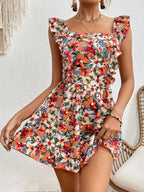 Women's sleeveless printed boho jumpsuit with square neckline by FitiqueFit, featuring a relaxed fit and vibrant pattern.