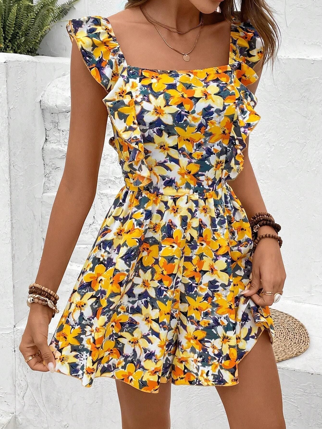 Women's sleeveless printed boho jumpsuit with square neckline, designed by FitiqueFit, featuring a stylish and comfortable fit.