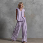 Women’s sleeveless striped top and full-length pants set by FitiqueFit, casualwear style, shown on a model.