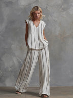 Women’s sleeveless striped top and full-length pants set by FitiqueFit, casualwear ensemble, shown in a stylish, comfortable outfit.