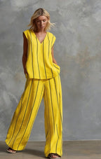 Women’s sleeveless striped top and full-length pants set by FitiqueFit, casualwear outfit with stylish vertical stripes.