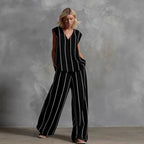 Women’s sleeveless striped top and full-length pants casualwear set by FitiqueFit, featuring a stylish sleeveless top and comfortable pants.