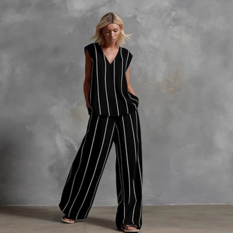 Women’s sleeveless striped top and full-length pants casualwear set by FitiqueFit, featuring a stylish sleeveless top and comfortable pants.