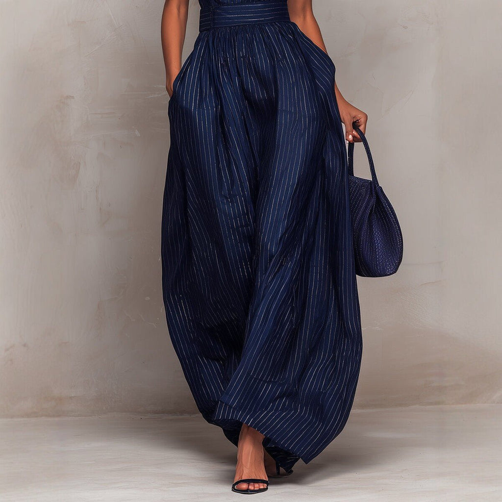 Women's sleeveless striped wide-leg jumpsuit with pockets by FitiqueFit, perfect casualwear for relaxed, stylish looks.