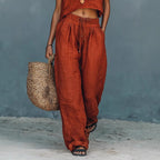 Woman wearing a linen blend sleeveless tank top and wide-leg pants set, casual summer two-piece outfit from Plush Fashion Hub.