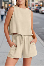 Women's sleeveless top and wide-leg shorts set by FitiqueFit, featuring retro street style casualwear with vibrant colors and relaxed fit.