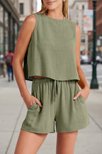 Women's sleeveless top and wide-leg shorts set by FitiqueFit, featuring retro street style casualwear in vibrant fabric.