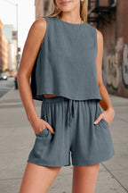 Women's sleeveless top and wide-leg shorts set by FitiqueFit, featuring retro street style casualwear, perfect for relaxed summer looks.