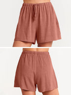 Women's sleeveless top and wide-leg shorts set by FitiqueFit, featuring a retro street style casualwear look.