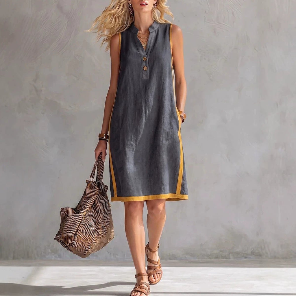 Women's sleeveless V-neck A-line midi dress by FitiqueFit with button front and side pockets, ideal casualwear for warm weather.