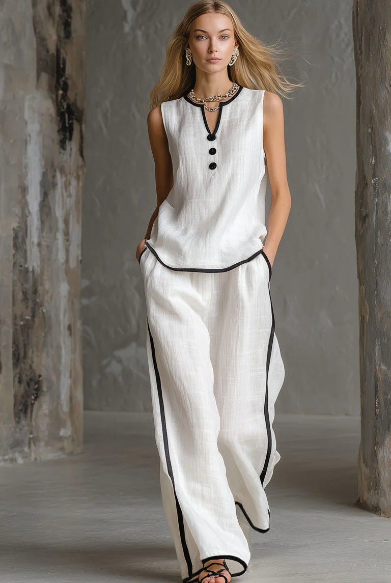 Women’s sleeveless V-neck wide-leg pants set by FitiqueFit, casualwear outfit with a stylish V-neck top and flowing wide-leg pants.