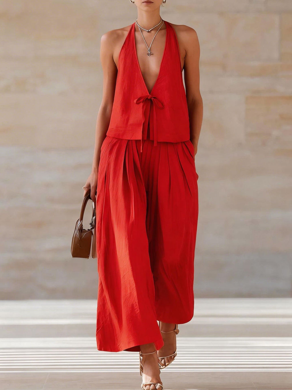 Women's sleeveless vest and wide-leg pants set by FitiqueFit, featuring a lace-up casualwear outfit with a stylish, relaxed fit.