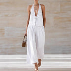 Women's sleeveless vest and wide-leg pants set in lace-up casualwear by FitiqueFit, featuring a stylish, comfortable 2-piece outfit.