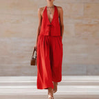 Women's sleeveless vest and wide-leg pants set by FitiqueFit, casualwear, featuring a lace-up design and relaxed fit.