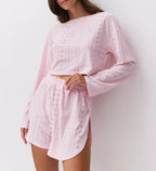 Women’s slim-fit loose suit two-piece shorts set by FitiqueFit, featuring casualwear style with a comfortable, relaxed fit.
