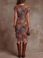 Women’s slim-fit printed V-neck waist dress by FitiqueFit, casualwear with a flattering silhouette and vibrant print.