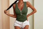 Women's slim-fit zipper vest top by FitiqueFit, casualwear style, shown in a close-up image highlighting the fitted design and zipper detail.