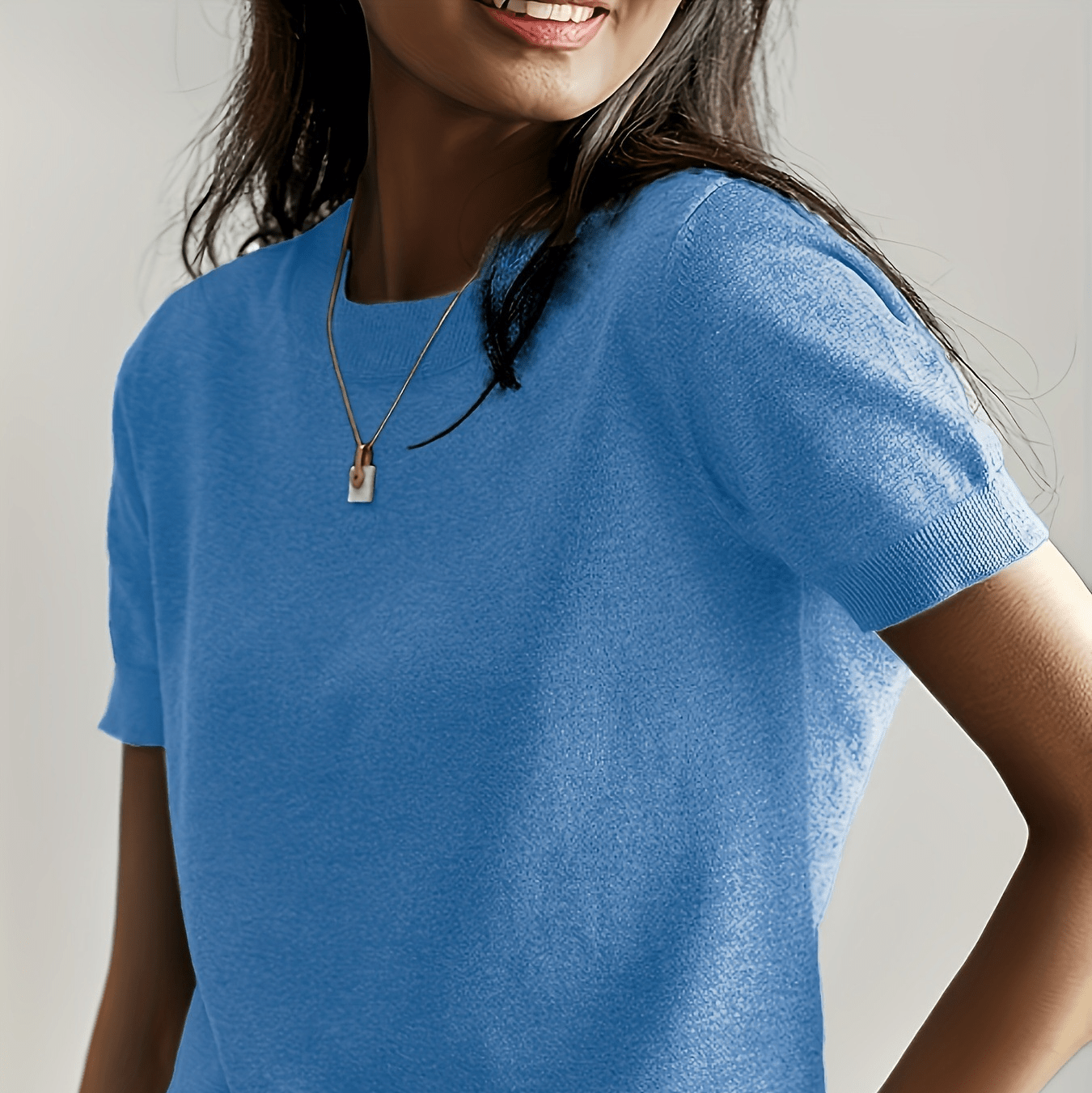 Women’s soft stretch minimalist T-shirt by FitiqueFit, slim fit casual top, made from comfortable, stretchy fabric for everyday wear.