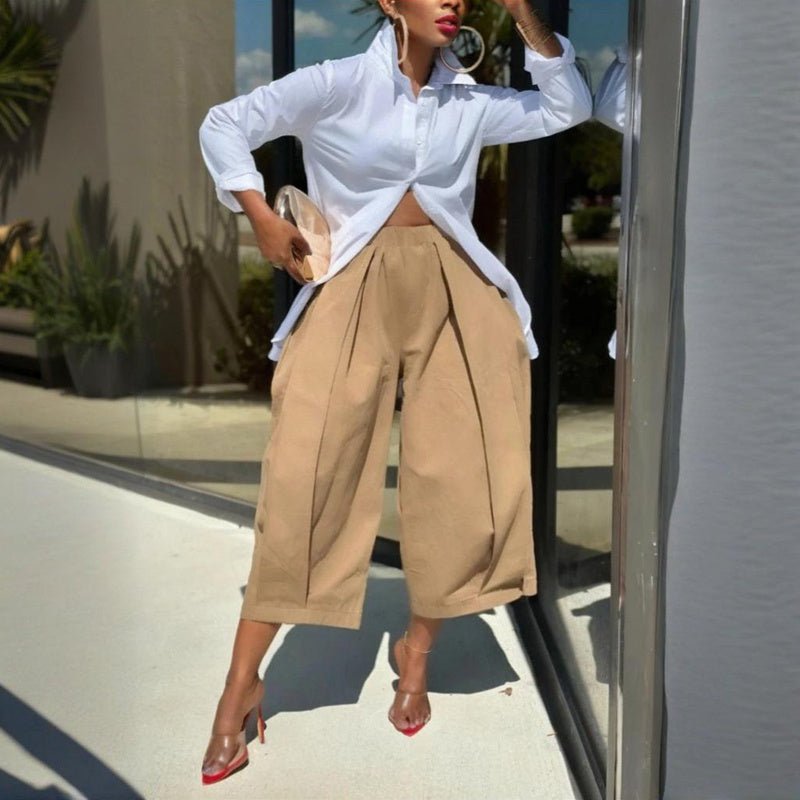 Women's solid color cotton wide-leg cropped pants by FitiqueFit, showing relaxed fit and comfortable casualwear style.