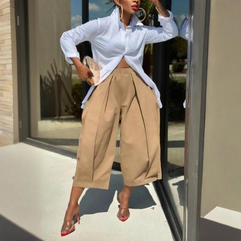 Women's solid color cotton wide-leg cropped pants by FitiqueFit, showing the relaxed fit and casual style in natural fabric.