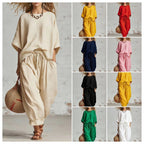 Women's solid color loose casual set with T-shirt and ankle pants from FitiqueFit, comfortable and relaxed daytime wear.