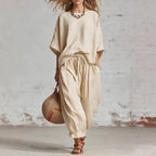 Women’s solid color casual set with a loose T-shirt and ankle pants by FitiqueFit, perfect for comfortable everyday wear.