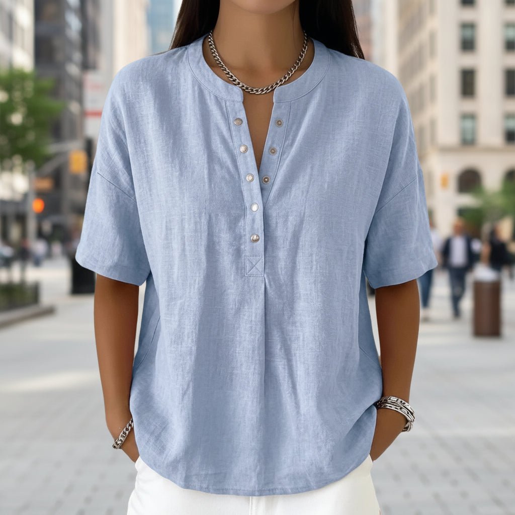 Women's solid color loose-fit short-sleeve pullover top by FitiqueFit, casualwear, shown in a relaxed fit style.
