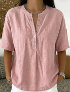 Women's solid color loose-fit short-sleeve pullover top from FitiqueFit, casualwear with a relaxed, comfortable fit.