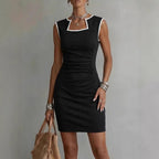 Women's solid color sleeveless knit midi dress by FitiqueFit, casual one-piece with a relaxed fit and knee-length design.