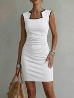 Women's solid color sleeveless knit midi dress by FitiqueFit, casual one-piece with a comfortable, stylish fit.