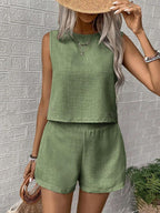 Women's solid color sleeveless vest and shorts set by FitiqueFit, casualwear outfit with a sleeveless top and matching shorts.
