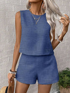 Women's solid color sleeveless vest and shorts casualwear set by FitiqueFit, featuring a relaxed fit and comfortable fabric.