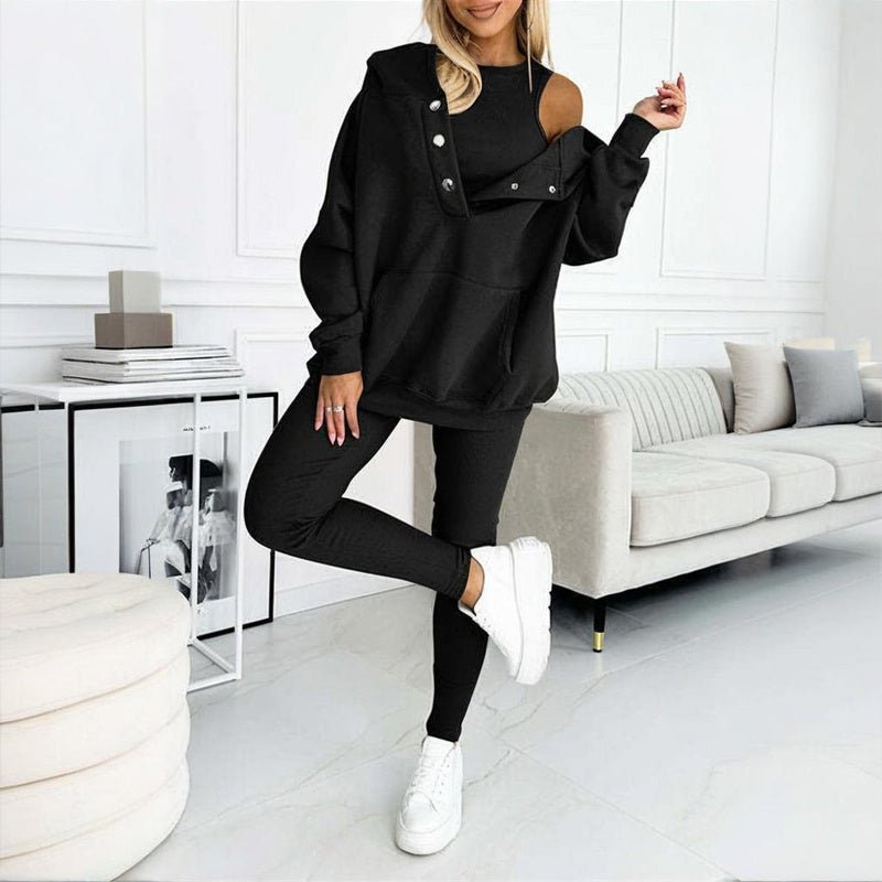 Women's solid color three-piece casualwear set by FitiqueFit, featuring a coordinated top, pants, and jacket in a soft, comfortable fabric.