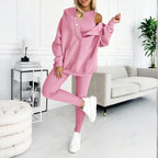 Women’s solid color three-piece casualwear set by FitiqueFit featuring a top, pants, and jacket, all in matching fabric and color.