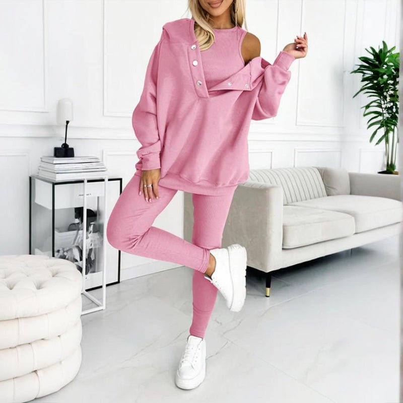 Women’s solid color three-piece casualwear set by FitiqueFit featuring a top, pants, and jacket, all in matching fabric and color.