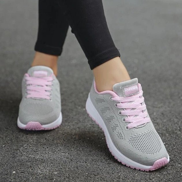 Women's lightweight, breathable running sneakers by FitiqueFit, designed for comfort and performance during sports activities.
