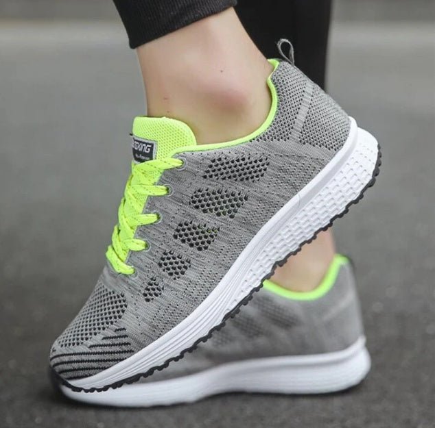 Lightweight, breathable women's sports sneakers by FitiqueFit designed for running and active wear.