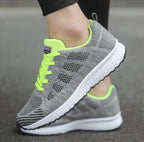 Lightweight, breathable women's sports sneakers by FitiqueFit designed for running and active wear.