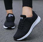 Women's lightweight, breathable FitiqueFit sports sneakers for running, designed for comfort and performance.