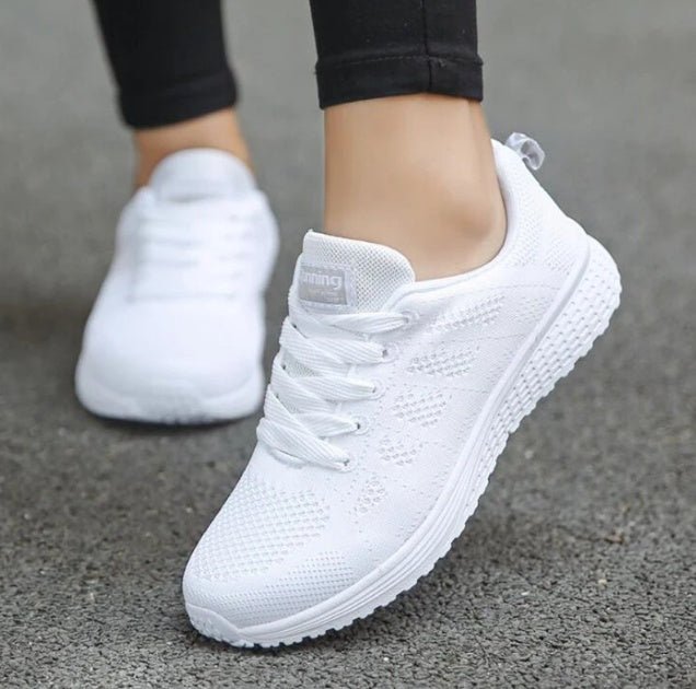 Women's lightweight breathable sports sneakers by FitiqueFit, designed for running and athletic activities.