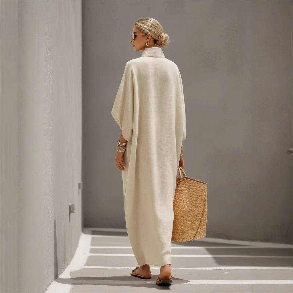 Women’s loose straight long dress with stand collar and button-down front by FitiqueFit, casualwear style, shown on a model.