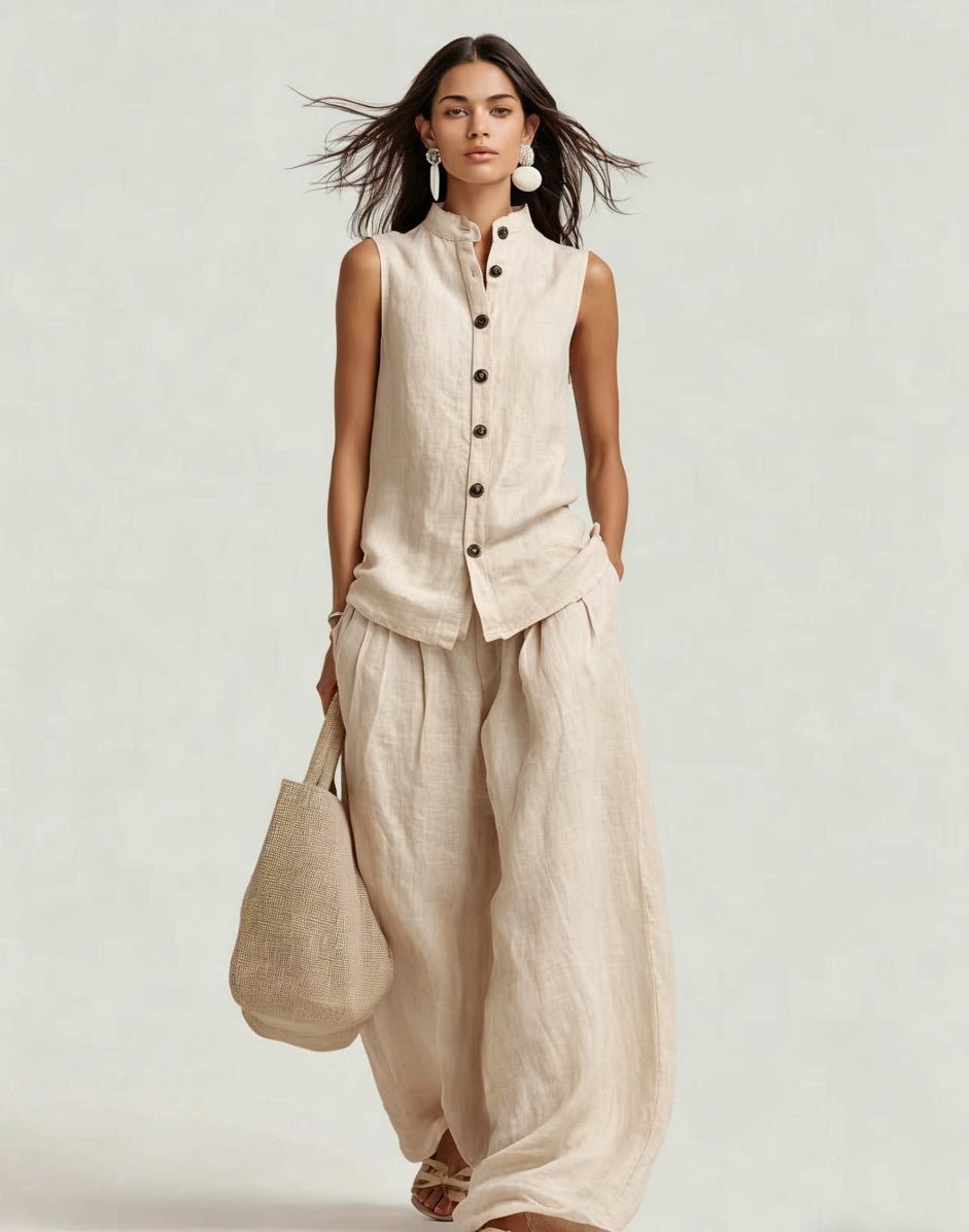 Women's casualwear set with a sleeveless stand collar top and high-waist wide-leg pants by FitiqueFit, shown on a model.
