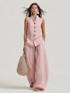 Women's casualwear set by FitiqueFit featuring a stand collar sleeveless top and high-waist wide-leg pants, stylish and comfortable.
