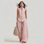 Women's casualwear set by FitiqueFit featuring a sleeveless stand collar top and high-waist wide-leg pants, perfect for stylish comfort.