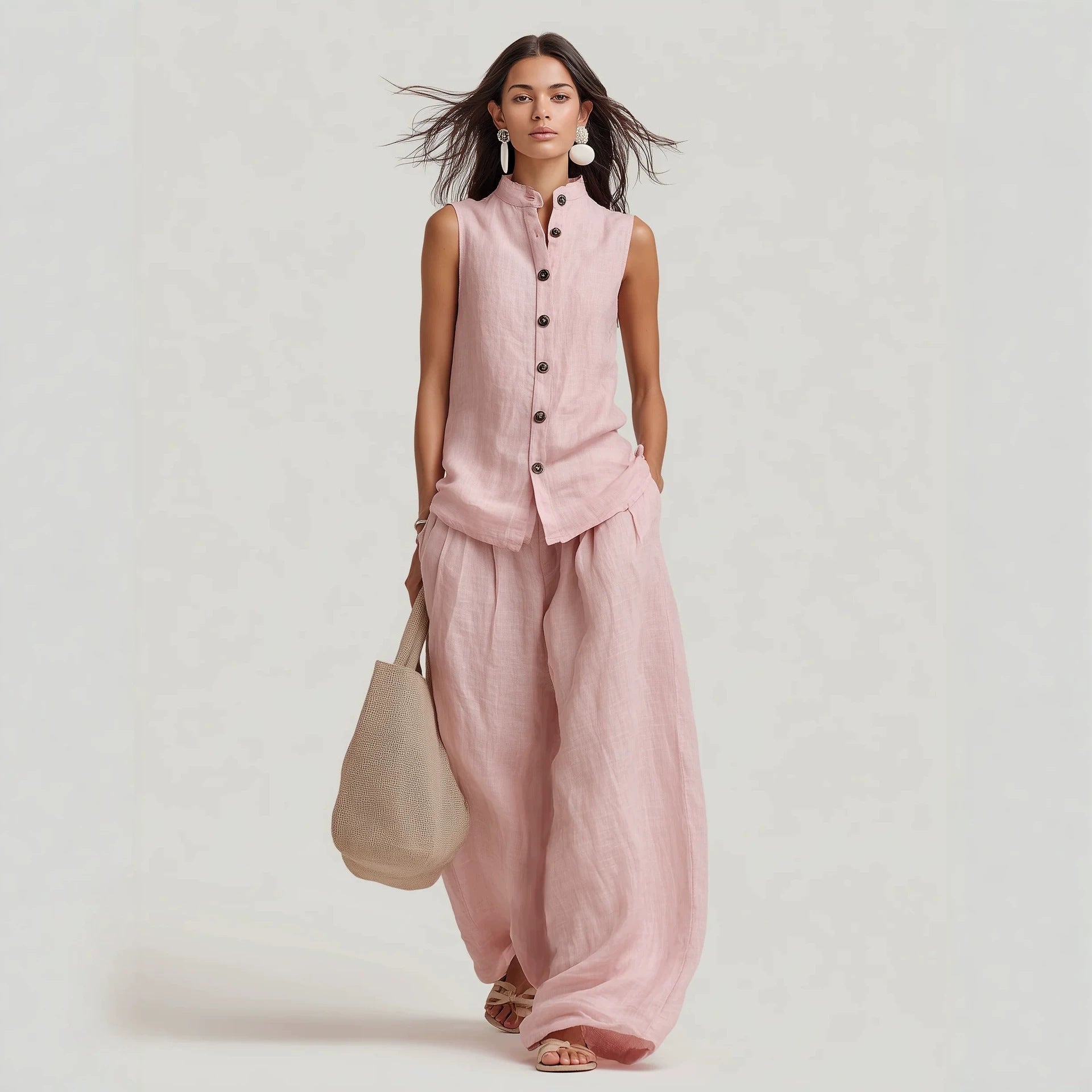 Women's casualwear set by FitiqueFit featuring a sleeveless stand collar top and high-waist wide-leg pants, perfect for stylish comfort.