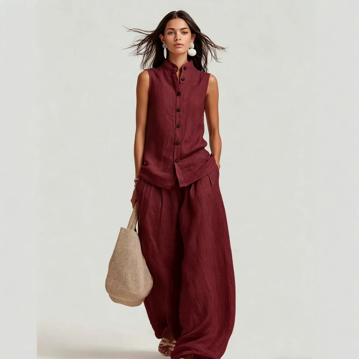 Women's casualwear set featuring a sleeveless stand collar top and high-waist wide-leg pants from FitiqueFit.